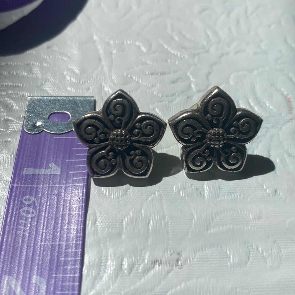 Hawaiian plumeria silver earrings.